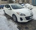 Белый Мазда 3, объемом двигателя 2 л и пробегом 118 тыс. км за 5700 $, фото 1 на Automoto.ua
