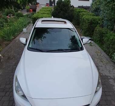 Белый Мазда 3, объемом двигателя 2 л и пробегом 169 тыс. км за 9400 $, фото 1 на Automoto.ua