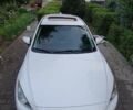 Белый Мазда 3, объемом двигателя 2 л и пробегом 169 тыс. км за 9400 $, фото 1 на Automoto.ua