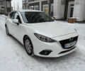 Белый Мазда 3, объемом двигателя 1.5 л и пробегом 150 тыс. км за 11000 $, фото 1 на Automoto.ua