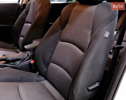 Білий Мазда 3, об'ємом двигуна 1.5 л та пробігом 93 тис. км за 13500 $, фото 29 на Automoto.ua