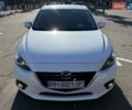 Білий Мазда 3, об'ємом двигуна 1.5 л та пробігом 93 тис. км за 12999 $, фото 4 на Automoto.ua