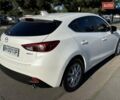 Білий Мазда 3, об'ємом двигуна 1.5 л та пробігом 93 тис. км за 12999 $, фото 7 на Automoto.ua