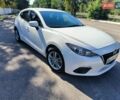 Белый Мазда 3, объемом двигателя 2 л и пробегом 141 тыс. км за 9600 $, фото 1 на Automoto.ua