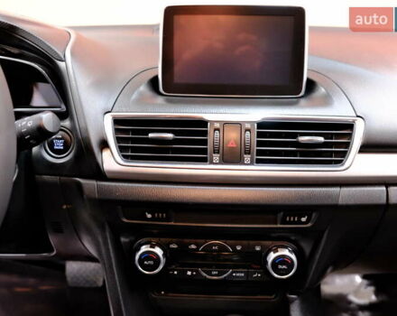 Білий Мазда 3, об'ємом двигуна 1.5 л та пробігом 93 тис. км за 13500 $, фото 17 на Automoto.ua