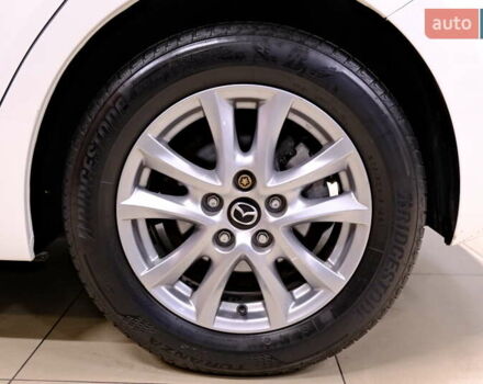 Білий Мазда 3, об'ємом двигуна 1.5 л та пробігом 93 тис. км за 13500 $, фото 44 на Automoto.ua