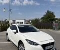 Белый Мазда 3, объемом двигателя 2 л и пробегом 90 тыс. км за 11507 $, фото 1 на Automoto.ua