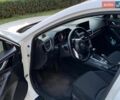 Белый Мазда 3, объемом двигателя 2 л и пробегом 122 тыс. км за 10500 $, фото 4 на Automoto.ua