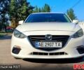 Белый Мазда 3, объемом двигателя 2 л и пробегом 141 тыс. км за 9600 $, фото 1 на Automoto.ua