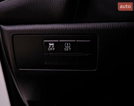 Білий Мазда 3, об'ємом двигуна 1.5 л та пробігом 93 тис. км за 13500 $, фото 23 на Automoto.ua