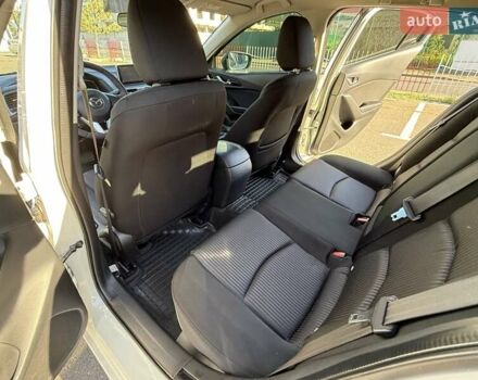 Білий Мазда 3, об'ємом двигуна 1.5 л та пробігом 93 тис. км за 12999 $, фото 15 на Automoto.ua