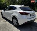 Білий Мазда 3, об'ємом двигуна 1.5 л та пробігом 129 тис. км за 12000 $, фото 4 на Automoto.ua