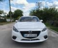 Белый Мазда 3, объемом двигателя 2 л и пробегом 102 тыс. км за 10950 $, фото 1 на Automoto.ua