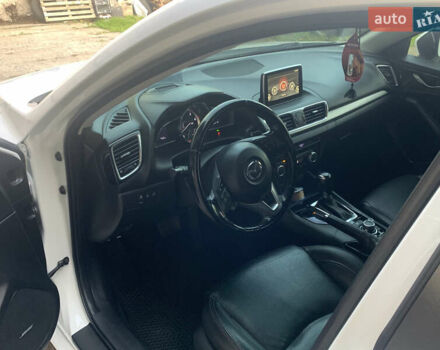 Белый Мазда 3, объемом двигателя 2.19 л и пробегом 225 тыс. км за 14000 $, фото 7 на Automoto.ua