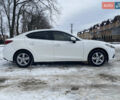 Белый Мазда 3, объемом двигателя 2 л и пробегом 180 тыс. км за 9500 $, фото 3 на Automoto.ua