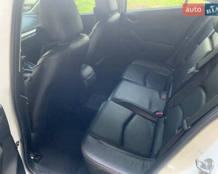 Белый Мазда 3, объемом двигателя 2.19 л и пробегом 225 тыс. км за 14000 $, фото 10 на Automoto.ua