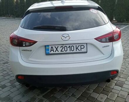 Белый Мазда 3, объемом двигателя 2 л и пробегом 140 тыс. км за 12500 $, фото 2 на Automoto.ua