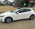 Белый Мазда 3, объемом двигателя 2 л и пробегом 149 тыс. км за 11500 $, фото 2 на Automoto.ua