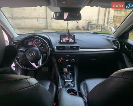 Белый Мазда 3, объемом двигателя 2.19 л и пробегом 225 тыс. км за 14000 $, фото 11 на Automoto.ua