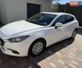 Белый Мазда 3, объемом двигателя 2.49 л и пробегом 103 тыс. км за 13250 $, фото 1 на Automoto.ua
