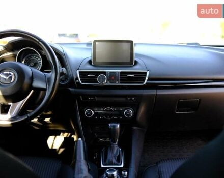 Білий Мазда 3, об'ємом двигуна 1.5 л та пробігом 74 тис. км за 14500 $, фото 7 на Automoto.ua