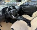 Белый Мазда 3, объемом двигателя 2 л и пробегом 201 тыс. км за 9538 $, фото 5 на Automoto.ua
