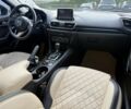 Белый Мазда 3, объемом двигателя 2 л и пробегом 201 тыс. км за 9538 $, фото 4 на Automoto.ua