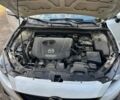 Білий Мазда 3, об'ємом двигуна 2 л та пробігом 76 тис. км за 11858 $, фото 13 на Automoto.ua