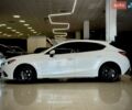 Белый Мазда 3, объемом двигателя 2 л и пробегом 199 тыс. км за 10899 $, фото 1 на Automoto.ua