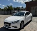 Білий Мазда 3, об'ємом двигуна 2 л та пробігом 130 тис. км за 11026 $, фото 1 на Automoto.ua