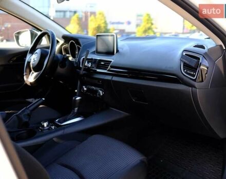 Білий Мазда 3, об'ємом двигуна 1.5 л та пробігом 74 тис. км за 14500 $, фото 6 на Automoto.ua