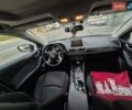 Белый Мазда 3, объемом двигателя 2 л и пробегом 199 тыс. км за 10999 $, фото 1 на Automoto.ua