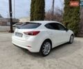 Білий Мазда 3, об'ємом двигуна 2.49 л та пробігом 105 тис. км за 13000 $, фото 13 на Automoto.ua