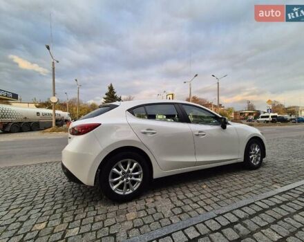 Белый Мазда 3, объемом двигателя 2 л и пробегом 199 тыс. км за 10999 $, фото 4 на Automoto.ua