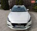 Білий Мазда 3, об'ємом двигуна 2.49 л та пробігом 105 тис. км за 13000 $, фото 5 на Automoto.ua