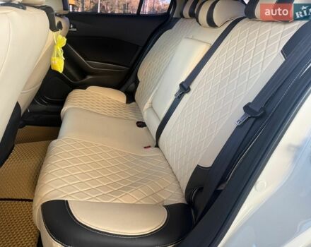 Білий Мазда 3, об'ємом двигуна 2 л та пробігом 201 тис. км за 9799 $, фото 10 на Automoto.ua
