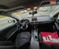 Белый Мазда 3, объемом двигателя 2 л и пробегом 199 тыс. км за 10499 $, фото 1 на Automoto.ua