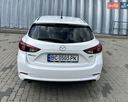 Белый Мазда 3, объемом двигателя 2 л и пробегом 55 тыс. км за 11700 $, фото 3 на Automoto.ua