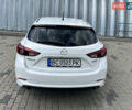 Белый Мазда 3, объемом двигателя 2 л и пробегом 55 тыс. км за 11700 $, фото 3 на Automoto.ua