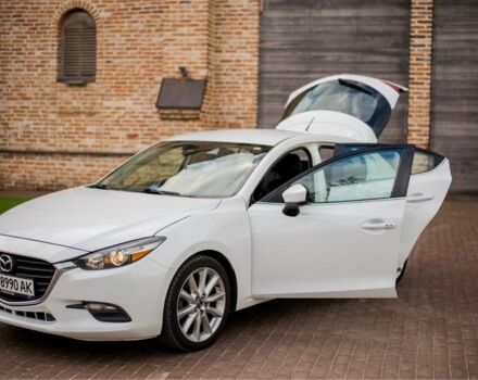 Белый Мазда 3, объемом двигателя 2 л и пробегом 154 тыс. км за 14950 $, фото 1 на Automoto.ua