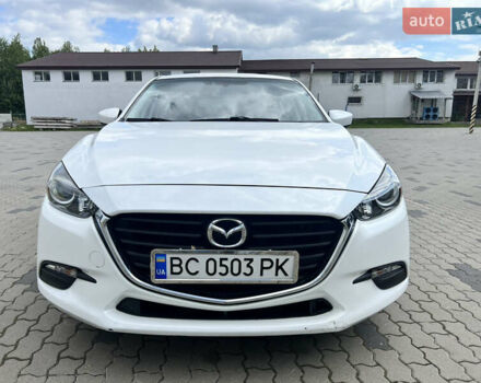 Белый Мазда 3, объемом двигателя 2 л и пробегом 55 тыс. км за 11700 $, фото 1 на Automoto.ua