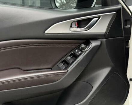 Белый Мазда 3, объемом двигателя 2.49 л и пробегом 91 тыс. км за 12800 $, фото 10 на Automoto.ua