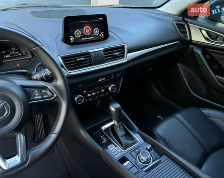 Білий Мазда 3, об'ємом двигуна 2.49 л та пробігом 81 тис. км за 14900 $, фото 7 на Automoto.ua