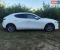 Білий Мазда 3, об'ємом двигуна 1.5 л та пробігом 71 тис. км за 16800 $, фото 4 на Automoto.ua