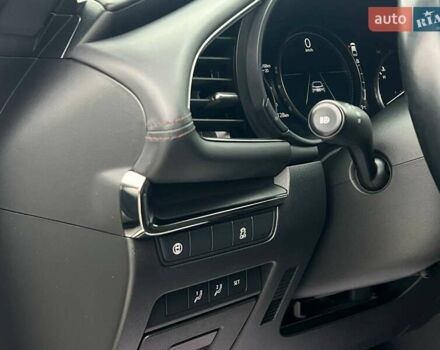 Білий Мазда 3, об'ємом двигуна 2.49 л та пробігом 85 тис. км за 15000 $, фото 9 на Automoto.ua