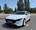 Белый Мазда 3, объемом двигателя 2.49 л и пробегом 79 тыс. км за 18000 $, фото 1 на Automoto.ua