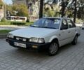 Білий Мазда 3, об'ємом двигуна 1.3 л та пробігом 281 тис. км за 851 $, фото 1 на Automoto.ua