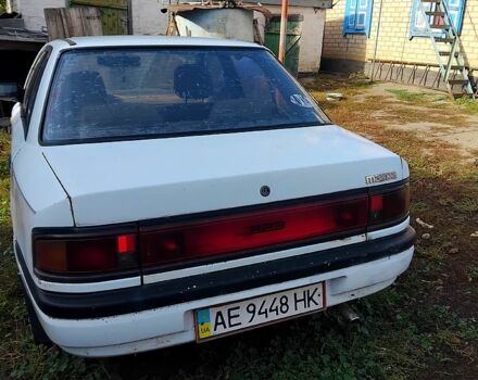 Белый Мазда 3, объемом двигателя 1.7 л и пробегом 300 тыс. км за 600 $, фото 5 на Automoto.ua