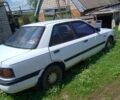 Белый Мазда 3, объемом двигателя 1.7 л и пробегом 270 тыс. км за 540 $, фото 1 на Automoto.ua