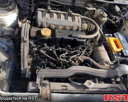 Белый Мазда 3, объемом двигателя 1.7 л и пробегом 300 тыс. км за 600 $, фото 2 на Automoto.ua